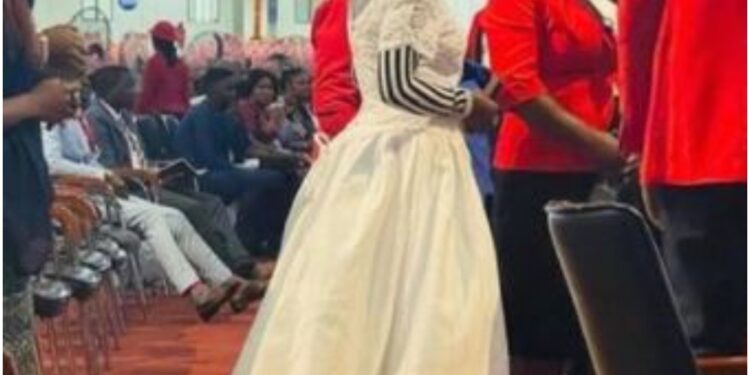 Drama As Woman Looking For Husband Wears Wedding Dress To Church (PHOTO)