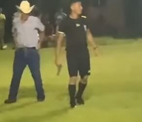 Drama As Referee Pulls Gun Out To Restore Order After Controversial Penalty Call Angered Fans (Photos)