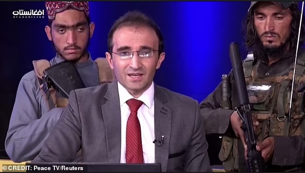 “Don’t Be Afraid” Afghan TV News Anchor Reads News With Heavily Armed Taliban Fighters In Studio (Photos)