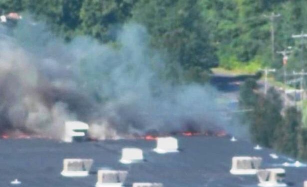 Horror!! Plane Crashes Into Building Leaving Huge Plumes Of Smoke (Photos)