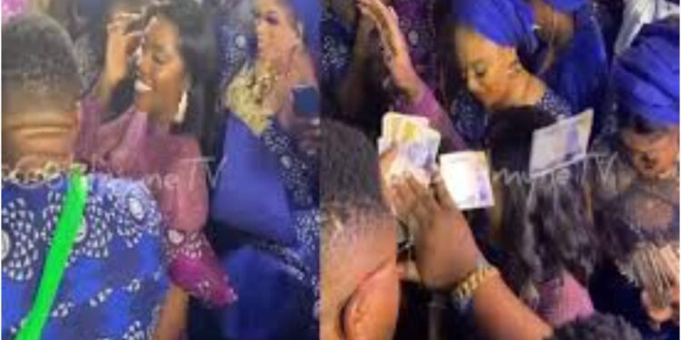 More Videos From Tiwa Savage’s Father’s Burial As Obi Cubana, Bobrisky, Toyin Abraham Make Money Rain (Video)
