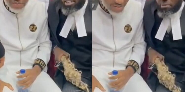 Aww, So Touching: See The Moment Nnamdi Kanu Shared Brief Smile With His Lawyer in Court (Video)