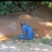 Man Prays Against Evil Nigerian Leaders, Takes Case To His Village Stream (Video)