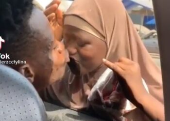 Man Causes Outrage After Making A Street Beggar kiss Him (Video)
