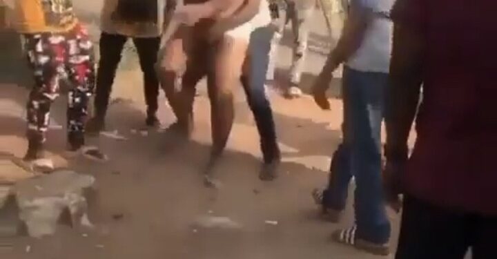 Suspected Yahoo Boy Runs Mad, Pulls Off His Clothes (Video)