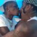 Mixed Reaction As Shatta Wale Is Spotted Kissing His Male Security Guard On The Mouth After Gifting A Diamond Neck Chain (Video)