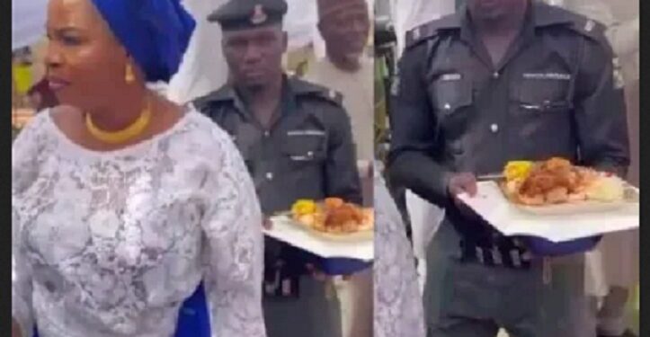 Nigerians React As Police Officer Held A Plate Of Food For His Madam At A Party (Video)