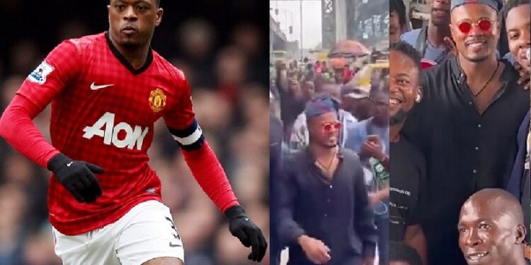 Jubilation As Man United Legend, Patrice Evra Visits Lagos Underbridge (Video)