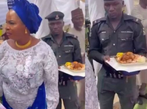 Update: Police Officer In Viral Video Carrying Female VIP’s Food Tray Asked To Report At Police Headquarters