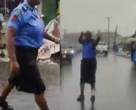 See Video Of Policewoman Controlling Traffic Under The Rain In Port Harcourt
