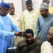 PDP Member Who Vowed To Never Have A Hair Cut Until Buhari Resigns Gets His Hair Shaved After Decamping To APC (Photos)