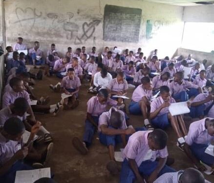 Photos Of High School Students Writing Their Promotion Exam On Bare Floor In Ogun State