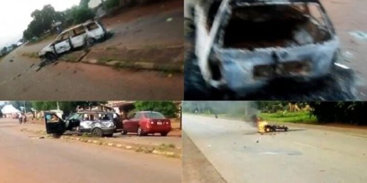 BREAKING: Buildings, Vehicles Destroyed As Thugs Attack PDP Members During Meeting