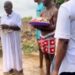Nigerian Man Who Threw Money In The Air While People Picked Is Spotted Carrying Out A ‘Ritual’ With A Native Doctor In A River (Video)