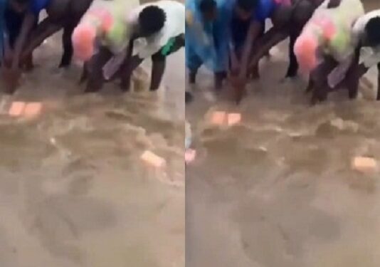 See The Moment Passersby Attempt To Rescue Man Swept By Flood In Lagos (Video)