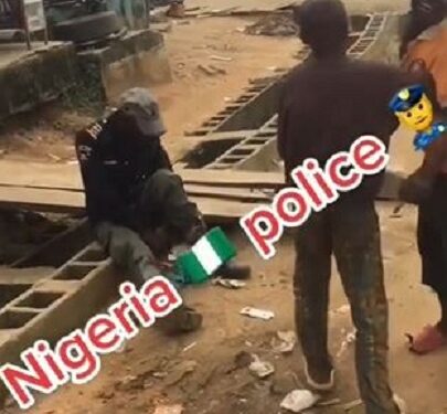 Children Mock ‘Drunk’ Police Officer After He Allegedly Fell Asleep In The Middle Of The Road (Video)