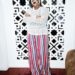 Singer Teni Stuns Fans As She Shows Off Trimmed Body In New Photos