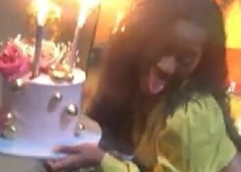 Watch The Moment A Lady’s Wig Caught Fire While Dancing With Her Birthday Cake (Video)