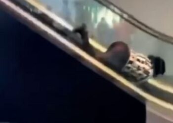 Lady Cries For Help After This Happened to Her While Using An Escalator (Video)
