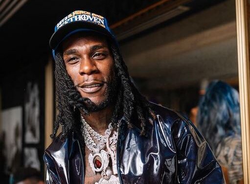 The Moment Burna Boy Kicked A Fan Off Stage (Video)