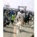 See The Moment Kano Residents Attack President Buhari’s Convoy, Stone Helicopter During His Visit To The State (Video)