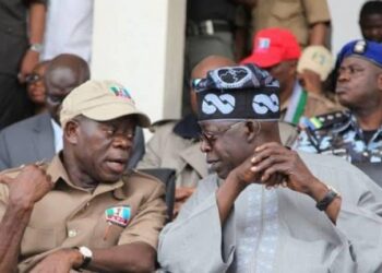 Nigerians, Atiku Slam Tinubu For Raising His Hands Up During National Anthem, Oshiomole Reacts (Video & Comments)