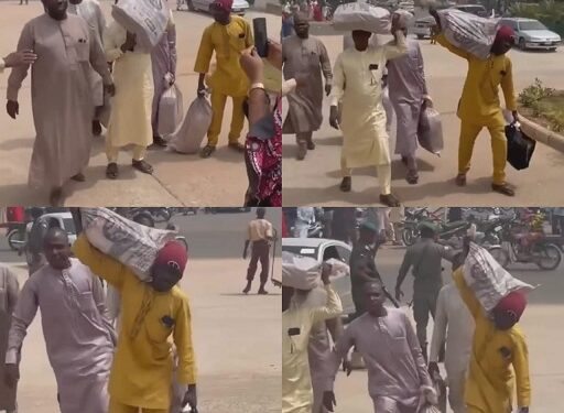 Watch Trending Video Of Nigerians Arriving CBN Office With Sacks Of Old N500 and N1000 Notes