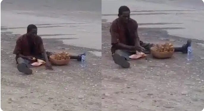 #Election: Drama As Mad Man Eats Up Food Sacrifice Placed At Lagos Polling Unit (Video)