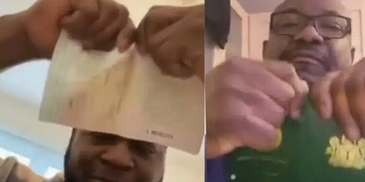 Angry Nigerian Men Based Abroad Tear Their Nigerian Passport Over Poor Conduct Of Election (Video)