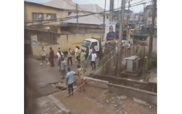 Thugs Walk Streets Of Fadeyi Chanting “If You No Vote APC No Come Outside” (Video)