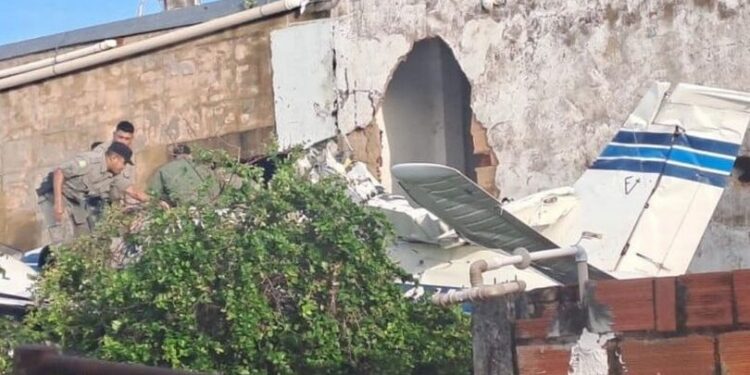Airplane Falls From Sky And Crashes Into A House Leaving Two Dead And Four Injured (Photos)
