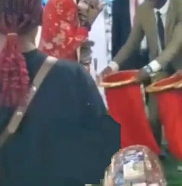 Watch The Moment Big Boys Showered Their Pastor With Stash Of Money At The Altar (Video)