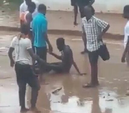 Watch The Moment Onlookers Rescued Man Trapped In Flood (Video)