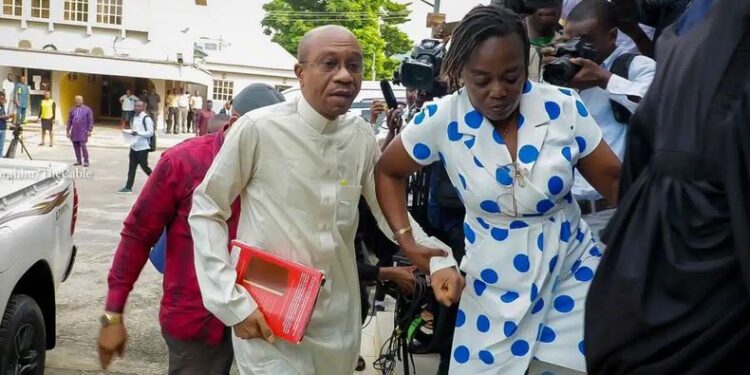 Watch The Moment Emefiele Arrives Court While Holding Bible (Video)