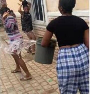 Lady Disgraces Young Sister For Wearing Short Dress to Church, Pours Water On Her (Video)