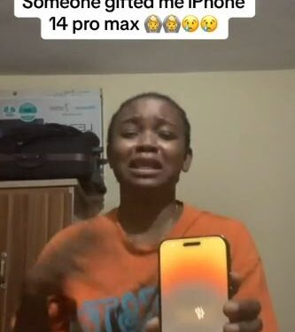 Viral Garri-drinking Lady Sheds Tears Of Joy As She’s Gifted iPhone 14 Pro Max After Davido’s N2M Gift (Video)