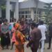 Nigerian Workers Protest At Ministry Of Works After Umahi Locked Them Out For Lateness