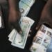 Nigerians React To Naira Historic Fall As 1,000 Crashes To One Dollar (Comments)