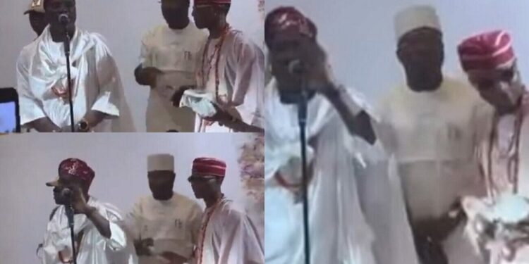 Wizkid Stirs Reactions As He Makes Money Rain On Kwam1 At His Mother’s Funeral (Video)