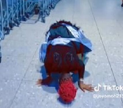 Nigerian Lady Rolls On The Floor At Airport After Crossing UK Border (Video)