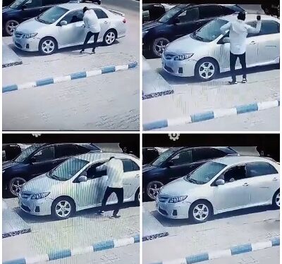 CCTV Captures Moment Thief Smashed Window Of A Parked Car And Stole An Item Inside It (Video)