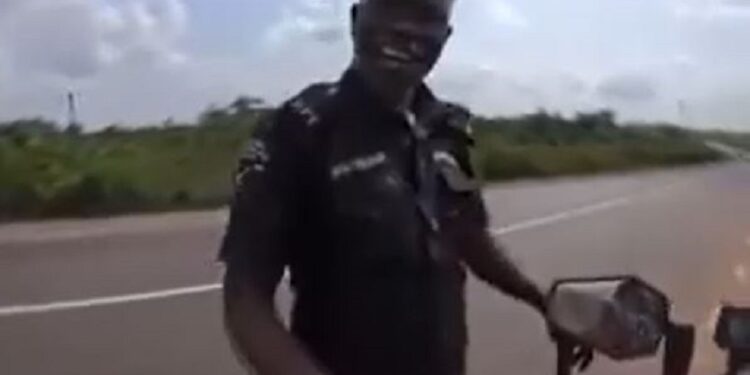 Police Officers Caught On Camera Begging Foreign Female Biker for Money (Video)