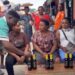 Nigerian Woman Wins ₦10,000 As She Finishes 3 Bottles Of Alcohol In Less Than A Minute (Video)