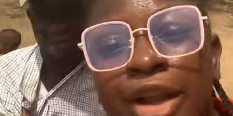 Drama As Nigerian Lady Arrests Dubious NEPA Officials for Disconnecting Her Light (Video)