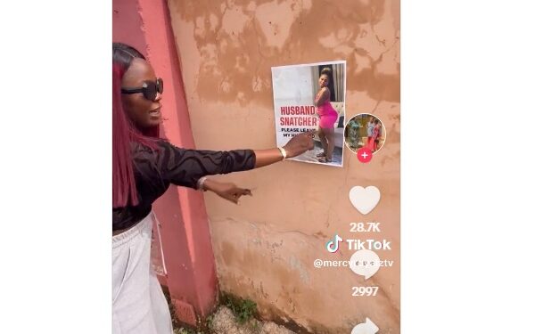 Wife Plasters Photo of Her Husband’s Sidechick On Walls to Warn Her (Video)