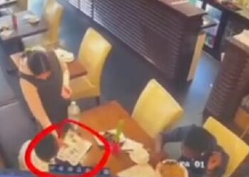 Nigerian Man Shares CCTV Footage Showing Moment Woman Stole His Friend’s Phone In A UK Restaurant (Video)
