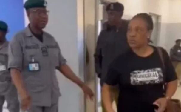 Drama As Nigerian Woman Tears Her Husband’s International Passport On Arrival At Airport (Video)