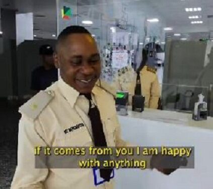 Immigration Officer Suspended After Video Of Him Asking A Tourist To Find Him ‘Anything’ Went Viral