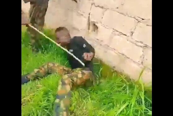 Nigerian Soldiers Publicly Torture, Flog Colleague For Allegedly Stealing, Selling Ammunition, Military Uniforms To Bandits (Video)