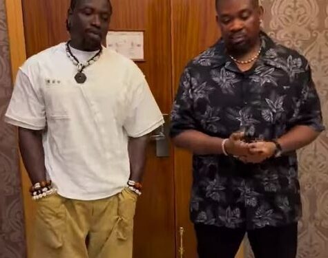 Very Dark Man Left Speechless As Don Jazzy Gifts Him A Huge Sum Of Money After Visiting Him (Video)